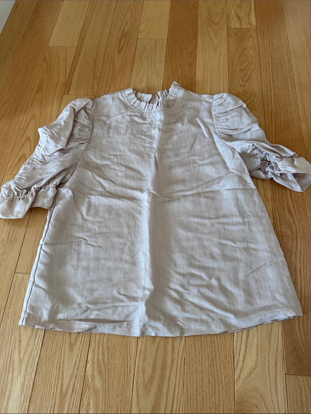 Moon River Ruffled Neck Puff Sleeve Top in Light Beige